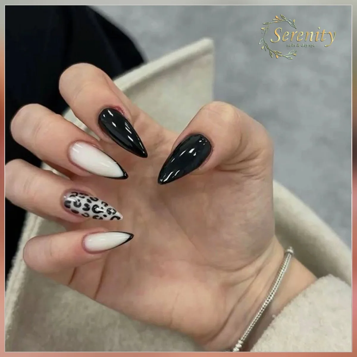 Forest green almond nails with cream and animal print accents